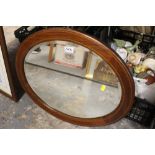 AN INLAID OVAL FRAMED MIRROR TOGETHER WITH FOUR PRINTS (5)