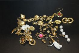 A QUANTITY OF 9CT GOLD AND YELLOW METAL EARRINGS ETC.