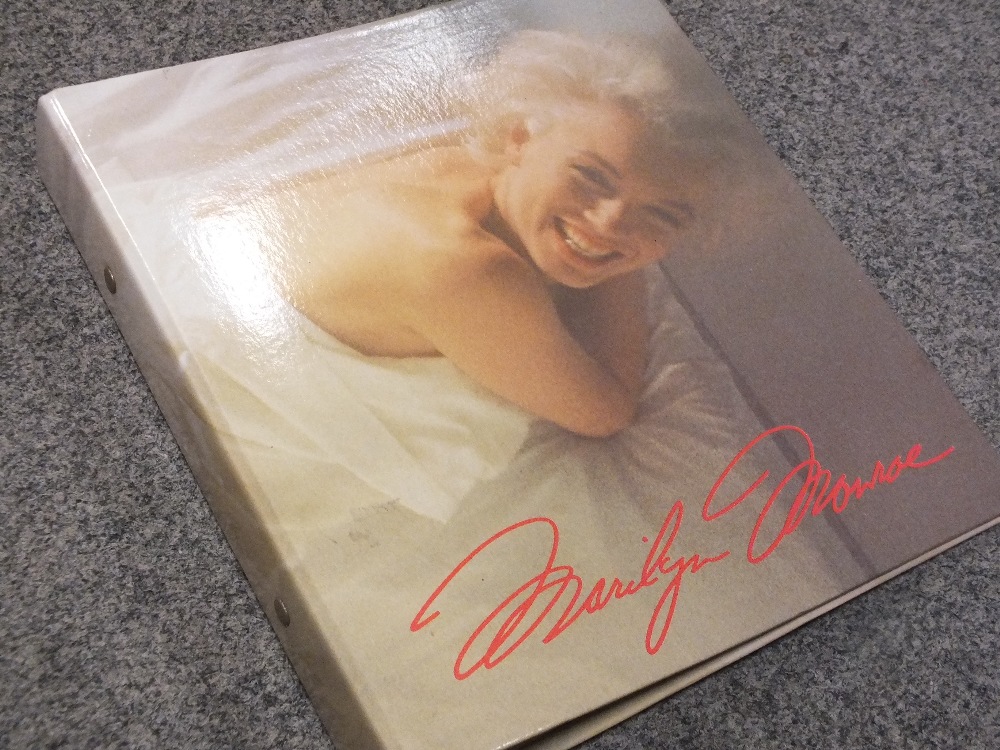 A BOX OF MARILYN MONROE FOLDERS, PHOTOGRAPH ALBUMS AND PUZZLES ETC. - Image 6 of 6