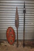 TWO WEST AFRICAN NIGERIAN BENIN PADDLE SPEARS AND A LARGE CONGO PAINTED WOODEN TRIBAL ART SHIELD (