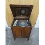 A VICTORIAN WALNUT CASED RECORD PLAYER WITH A GARRARD RECORD PLAYER (CONVERTED) A/F