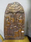 AN UNUSUAL CARVED TRIBAL PANEL DEPICTING FIGURES, 65 X 37 CM