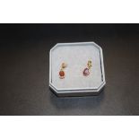 A PAIR OF 9CT GOLD AND GARNET EARRINGS