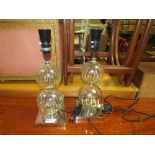 A PAIR OF MODERN GLASS TABLE LAMPS (NO SHADES)