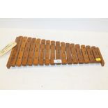 A VINTAGE WOODEN XYLOPHONE MADE BY K I AND CO OF JAPAN L - 48CM
