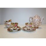 TWO ROYAL TUSCAN CUP SAUCER AND SIDE PLATE TRIOS AND A JUG AND SUGAR BOWL, TOGETHER WITH A ROYAL