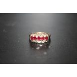 A HALLMARKED 9 CARAT GOLD RUBY AND DIAMOND DRESS RING SIZE - N APPROX WEIGHT - 4G