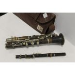 A VINTAGE CLARINET MARKED BUFFET CRONNON & CO A PARIS, TOGETHER WITH A PICCOLO (2)