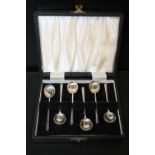 A CASED SET OF SIX HALLMARKED SILVER COFFEE SPOONS APPROX WEIGHT - 34G