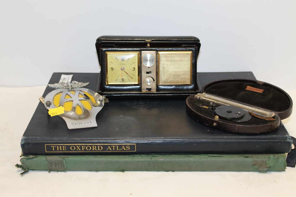 A CLIFFORD BROWN OPHTHALMOSCOPE TOGETHER A ESTYMA TRAVELLING RADIO ALARM CLOCK, VINTAGE AA BADGE,