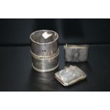 TWO HALLMARKED SILVER NAPKIN RINGS, TOGETHER WITH A HALLMARKED SILVER VESTA CASE AND ANOTHER
