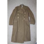 A VINTAGE MILITARY SIZE 1 GREAT COAT DATED 1952