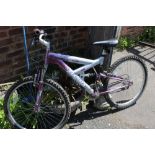A PURPLE MAGNA BICYCLE