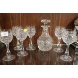 A SET OF SIX THOMAS WEBB CRYSTAL WINE GLASSES, TOGETHER WITH A MATCHED DECANTER (7)