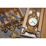 A BOXED IMPERIAL BRASS CLOCK GARNITURE