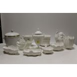 A COLLECTION OF WHITE/ UNPAINTED CERAMICS TO INCLUDE COALPORT EXAMPLES, TWIN HANDLED URN ETC. (10)
