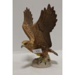 A BESWICK 2062 MATTE FINISH GOLDEN EAGLE FIGURE