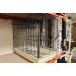 A PET CAGE AND STAND