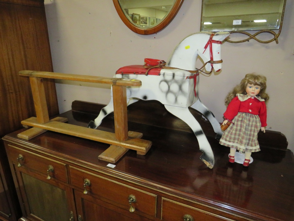 A VINTAGE NAIVE ROCKING HORSE ON A TRESTLE BASE - IN NEED OF RESTORATION AND A DOLL (2) - Image 3 of 4