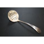 A HALLMARKED SILVER SIFTER SPOON