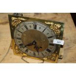 A BRASS FACED GRAND DAUGHTER CLOCK MOVEMENT AND WEIGHTS
