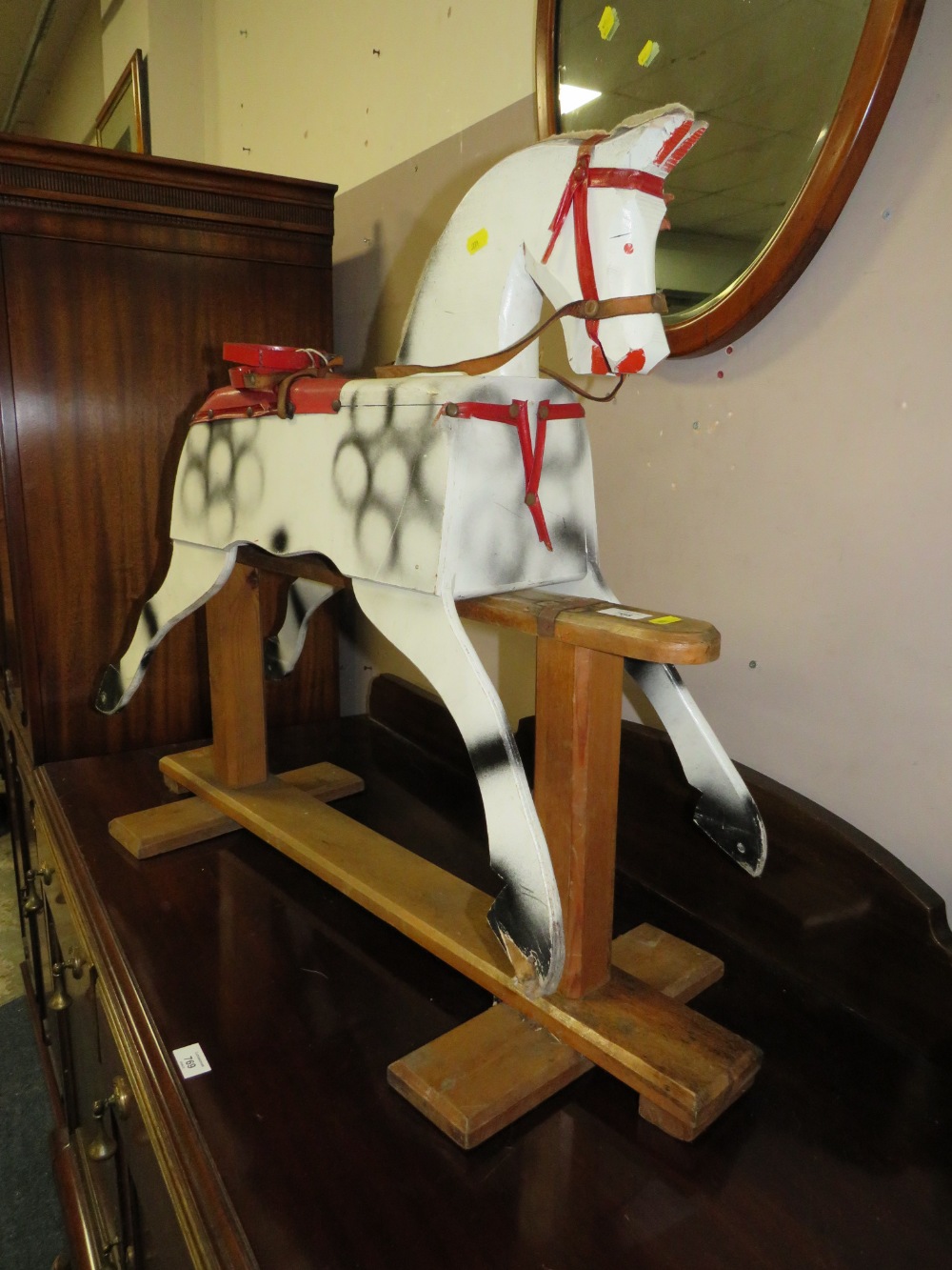 A VINTAGE NAIVE ROCKING HORSE ON A TRESTLE BASE - IN NEED OF RESTORATION AND A DOLL (2) - Image 2 of 4