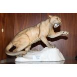 A BESWICK MATTE FINISH PUMA ON A ROCK FIGURE