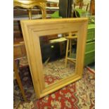 AN ANTIQUE PINE RECTANGULAR WALL MIRROR - 95 X 80 CM