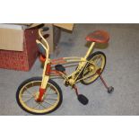 A CHILDS VINTAGE METAL MOBO TOT-CYCLE