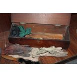 AN ANTIQUE MAHOGANY GLOVE BOX AND CONTENTS