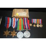 FOUR WWII MEDALS WITH ORIGINAL BOX, TOGETHER WITH A MINIATURE BAR OF WWII MEDALS