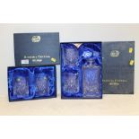 A BOXED BOHEMIA CRYSTAL DECANTER AND FOUR TUMBLER SET