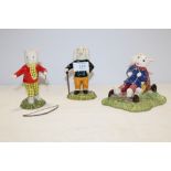 TWO ROYAL DOULTON RUPERT THE BEAR FIGURES COMPRISING OF 'LEADING THE WAY', FINISHING ARROWS AND