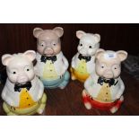 FOUR LARGE CERAMIC ELL GREAVE RETRO PIGGY BANKS H-24CM