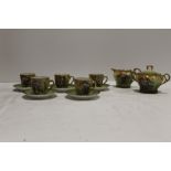 A HAND PAINTED FIGURAL PART TEA SET WITH BEEHIVE TYPE BACKSTAMPS