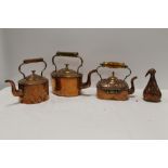 THREE VINTAGE COPPER KETTLES, TOGETHER WITH A 'BIRD FUNNEL'