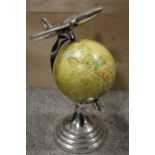 A MODERN CHROME EFFECT AEROPLANE TOPPED DESK GLOBE H- 30CM