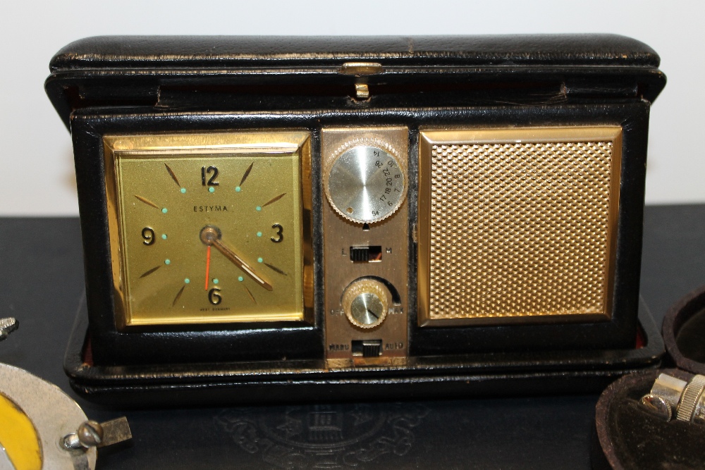 A CLIFFORD BROWN OPHTHALMOSCOPE TOGETHER A ESTYMA TRAVELLING RADIO ALARM CLOCK, VINTAGE AA BADGE, - Image 3 of 4