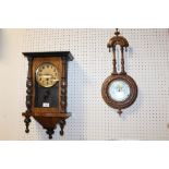 A CARVED MAHOGANY WALL BAROMETER, TOGETHER WITH A MAHOGANY WALL CLOCK (2)