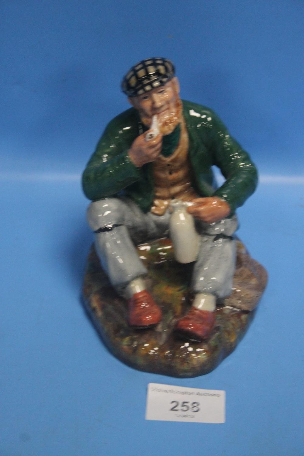 A ROYAL DOULTON FIGURE "THE WAY FARER"