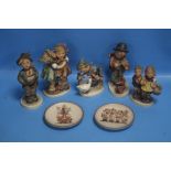 A COLLECTION OF HUMMEL FIGURES AND TWO PIN DISHES