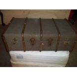 A WOODEN BANDED TRAVEL TRUNK WITH INNER TRAY