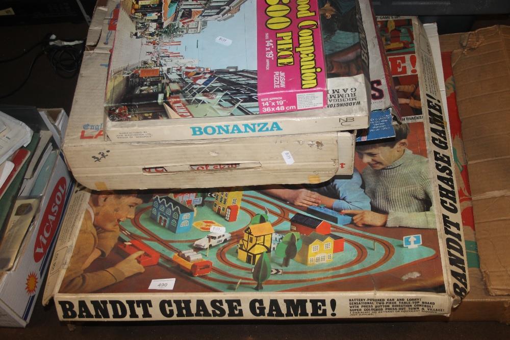 A QUANTITY OF BOXED VINTAGE GAMES TO INCLUDE LAN DARTS, ETC