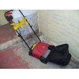 A POWER DEVIL ELECTRIC LAWN RAKE