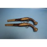 A NEAR PAIR OF EASTERN FLINTLOCK PISTOLS