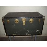 A LARGE TRAVEL TRUNK