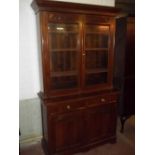 A BOOKCASE WALL CUPBOARD