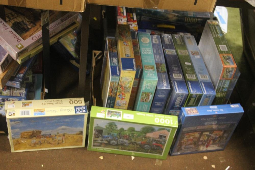 A LARGE QUANTITY OF MAINLY NEW JIGSAWS (TRAYS NOT INCLUDED)