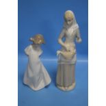 A NAO FIGURINE TOGETHER WITH AN UNNAMED EXAMPLE