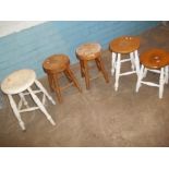 A QUANTITY OF 5 VINTAGE WOODEN STOOLS